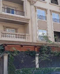 شقة للبيع دور ارضي مرتفع بالنرجس عمارات