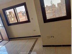 شقه للبيع بالهضبه الوسطي الحي الرابع