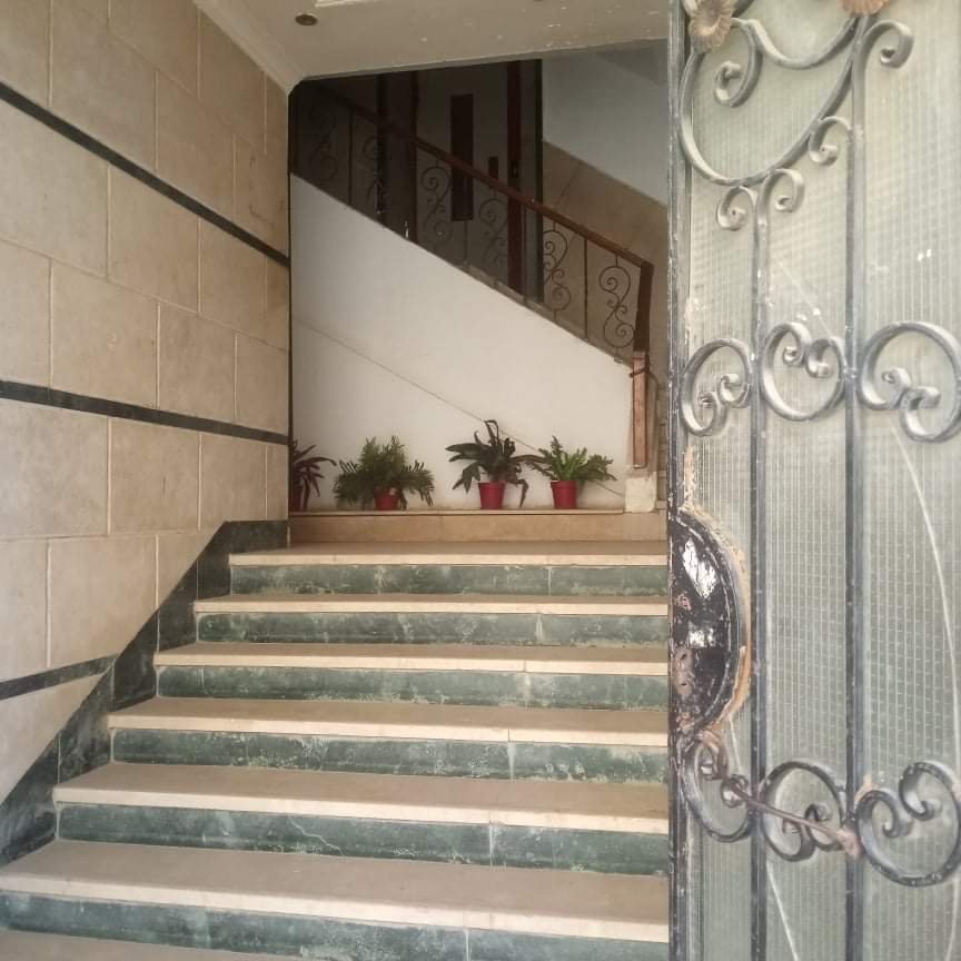 شقة للبيع بالحى الخامس منطقة الفلل 6 اكتوبر